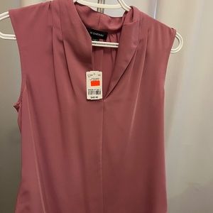 Pink sleeveless blouse